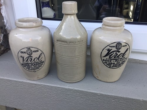 Two medium size virol jars - medium,