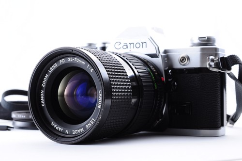 Canon silver zoom lens - /,