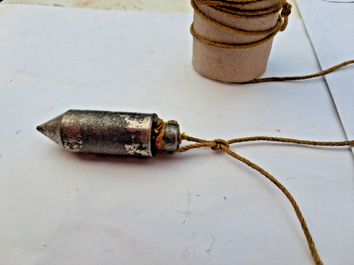 Vintage plumb bob and line - and,