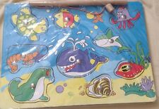 child's magnetic fishing game and rod