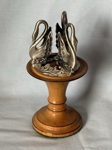 Metal swans turned wooden - metal, on
