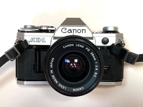 Canon camera with the - canon, camera,