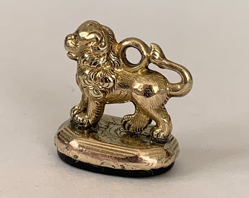 Antique gold cased lion fob - lion,