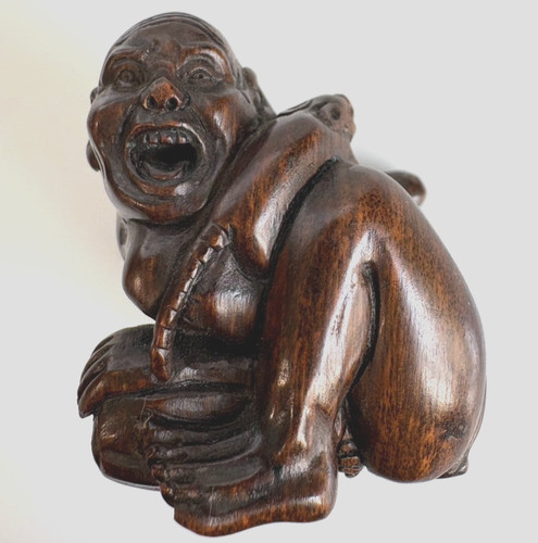 Person netsuke wood carving - person,