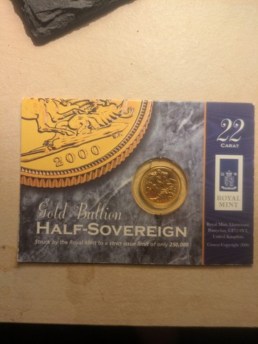 Gold half sovereign coin year - half,