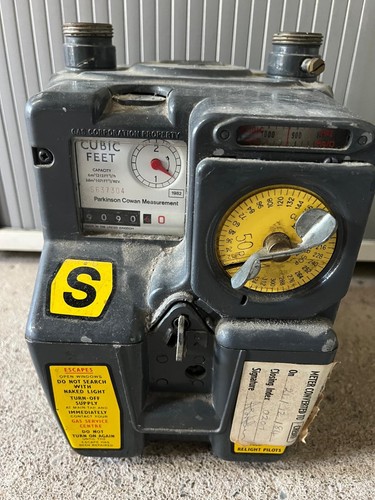 Old coin operated gas - coin,