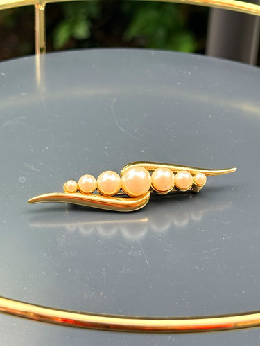 Monet signed gold tone curved