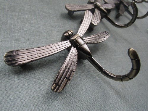 Antique brass hook rail