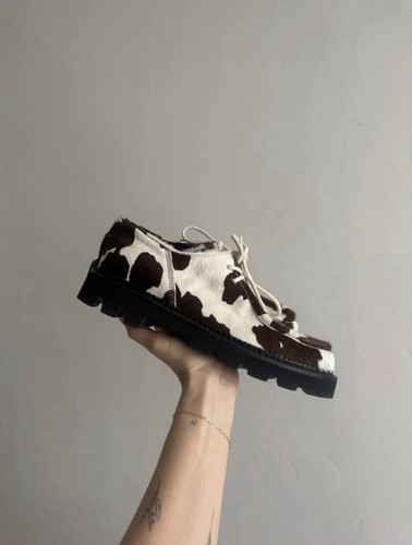 Collegium cow print pony - collegium,