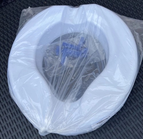 Raised white toilet seat - 2”,