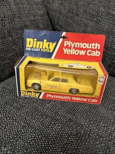 Dinky plymouth yellow cab - yellow,