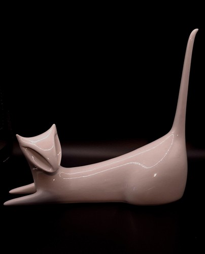 White lying cat porcelain art - lying,