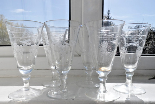 Six engraved glass - flutes, or