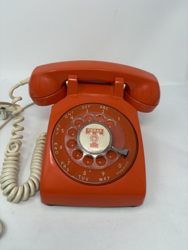 Orange rotary desk phone - rotary,