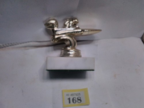 Speedboat car mascot - on, plinth
