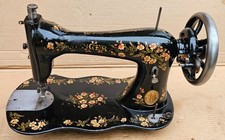 Singer fiddle base improved