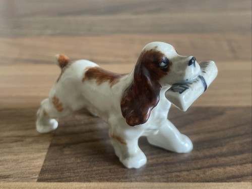 Miniature ceramic figurine - , of