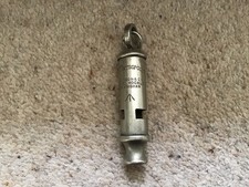 Vintage whistle has engraved