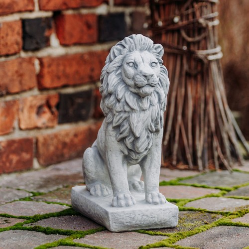 Sitting lion stone figure - lion,