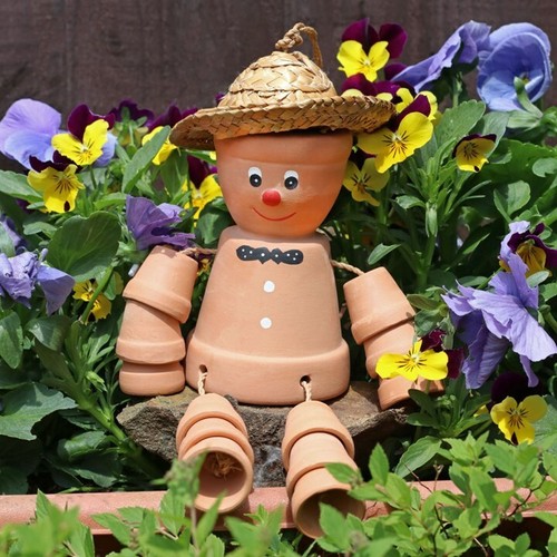 Terracotta flower pot man - flower,