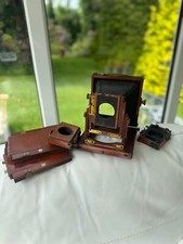Vintage  MAHOGANY PLATE CAMERA WITH THORNTON PICKARD SHUTTERS' AND FILM HOLDERS.