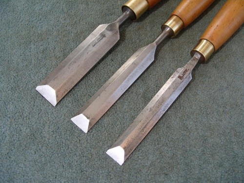 Three bevel edged chisels - three,