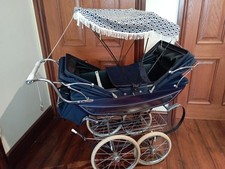 Silver Cross 1970s twin Dolls Pram with bag and sun shade, excellent Condition..