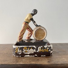 Antique “The Golden Spirit” Lemon Hart Rum Advertising Ceramic Figure Ashtray