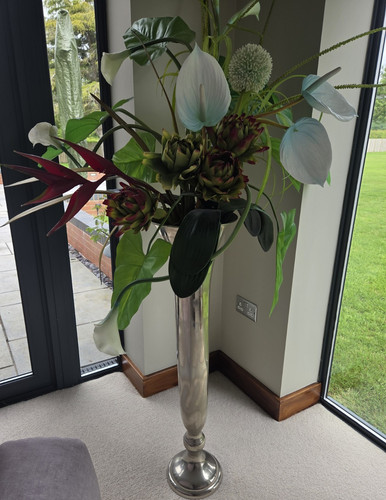Tall silver metal floor - floor, vase