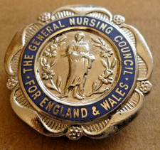 VINTAGE ENAMEL BADGE GENERAL