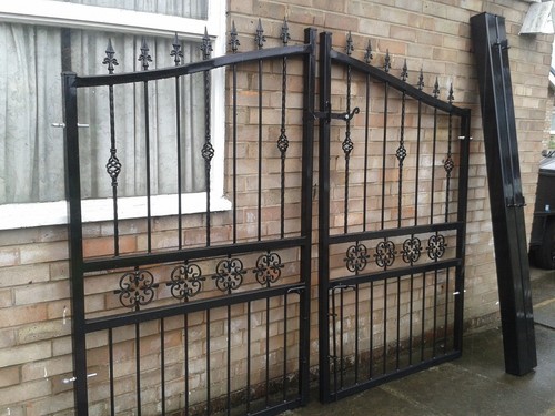 New wrought iron driveway - iron,