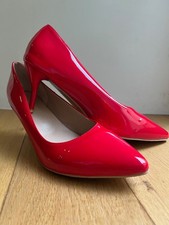 Red court shoes, stiletto