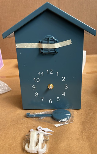 Cuckoo clock birdhouse design - clock,