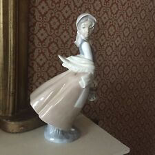 Lladro Nao Girl with basket figurine.