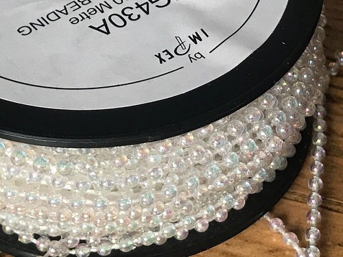 Single strand pearl - &,