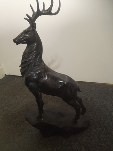 Bronze effect figurine - of, a