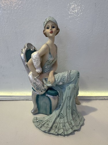 Art deco flapper lady seated - art,