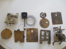 Various Antique Brass clock movement parts from Mantle clocks including a gong