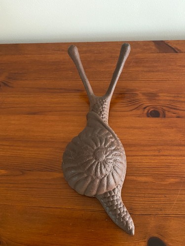 Cast iron snail design coat - cast,