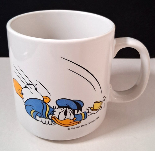 Donald duck holding - a, and