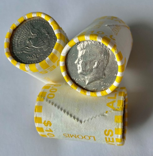 One kennedy half dollar - half,
