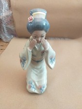CASADES Porcelain Figurine