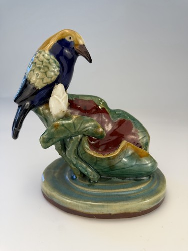 Majolica bird perched water - on,