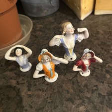Four Vintage Porcelain Pin