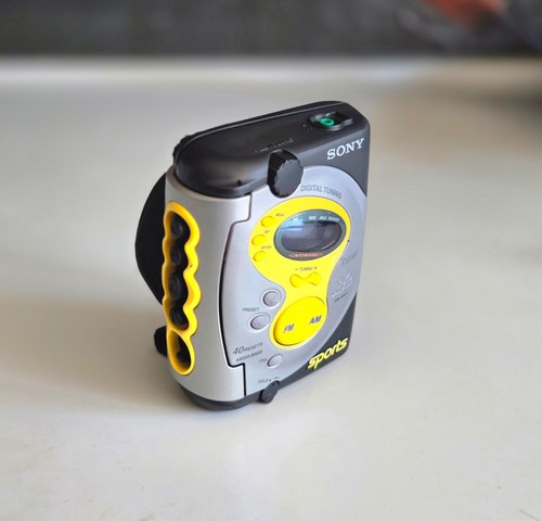 Sony sports yellow walkman - sony,
