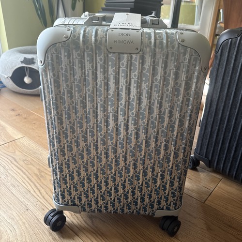 New with tag dior and - new, rimowa