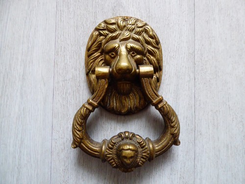 Solid brass lion door knocker - brass,