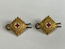 2 Genuine WW2 Red Cross Pips Cap Badges