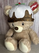 CLINTONS  CHRISTMAS TEDDY BEAR WEARING A  XMAS PUDDING HAT 13” 