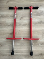 2 X Red Pogo Sticks By Indy
